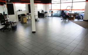 Cleaning Porcelain Car Showroom Weybridge Before